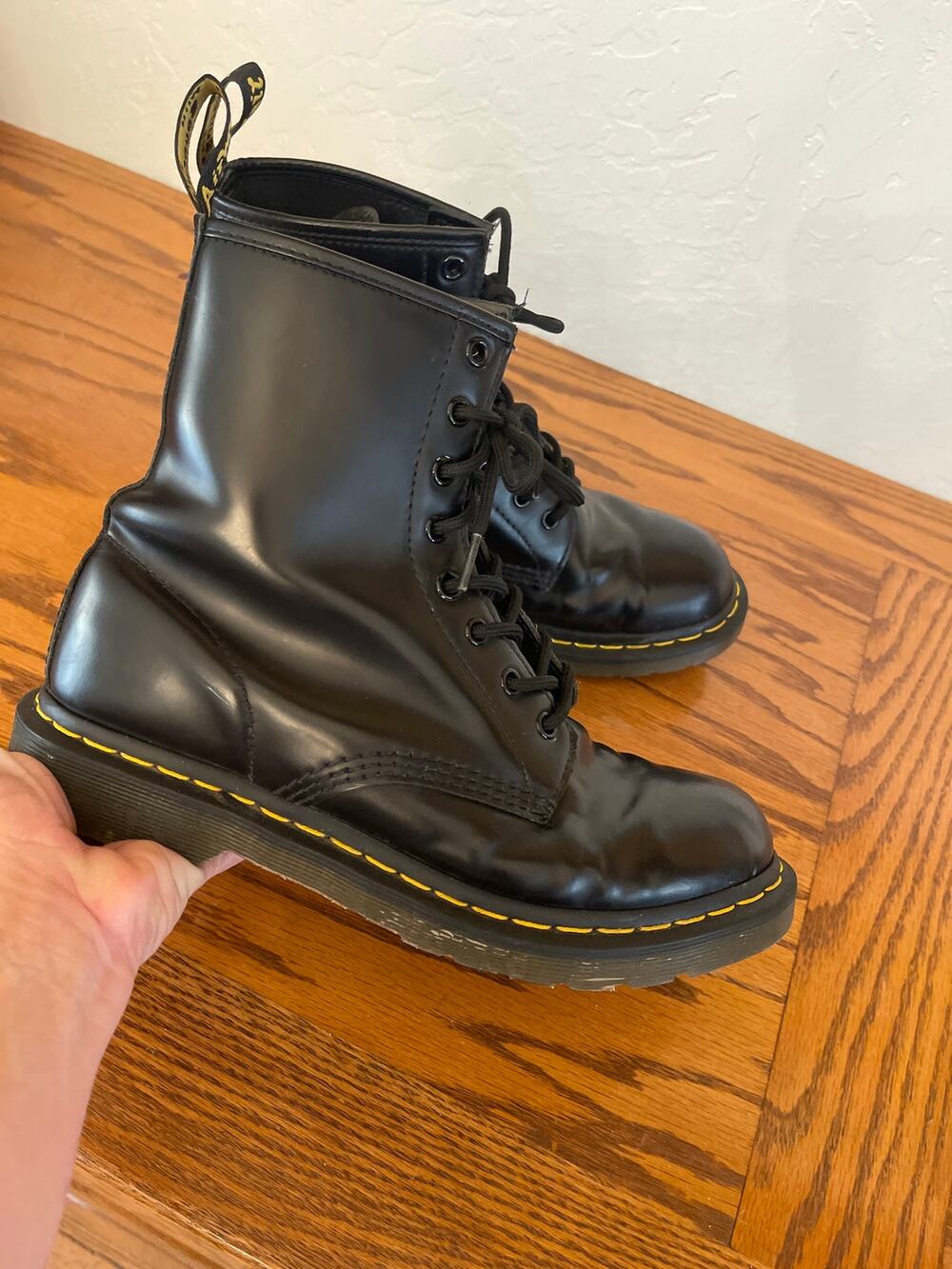 The classic black smooth leather Dr. Martens 1460 8-eye boots, size 9